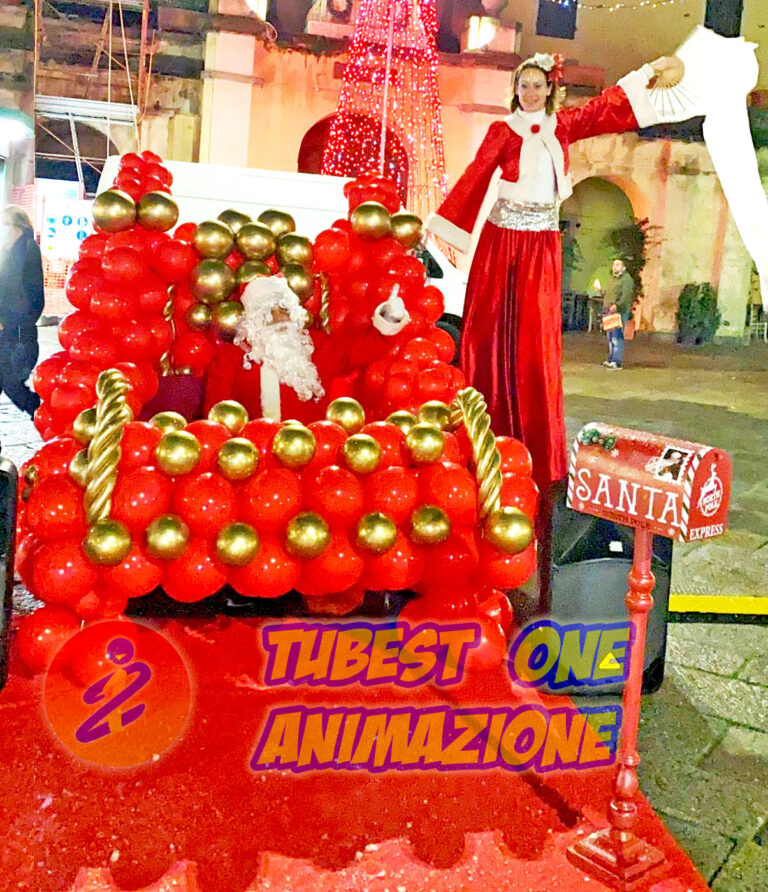 Slitta di Babbo Natale di palloncini con trampoliere per evento di natale
